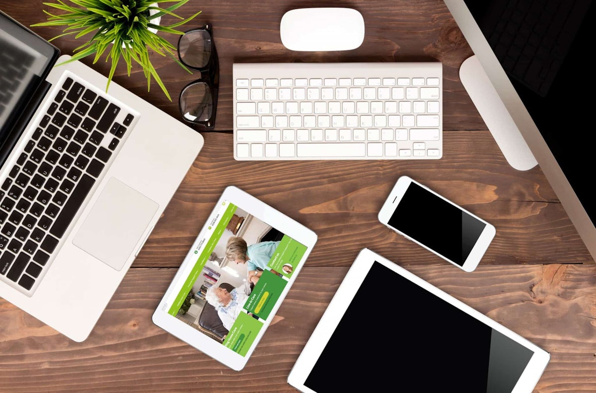 Different electronic devices placed on a table