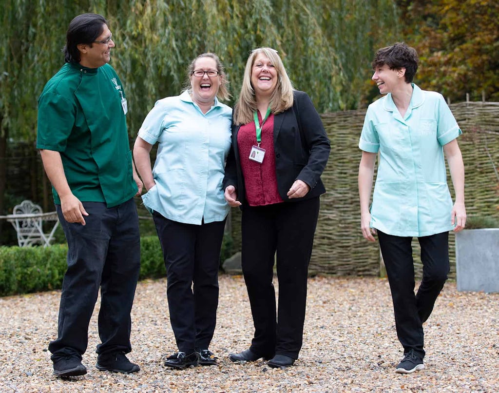 Team photo of carers and staff - Visiting Care and Live-in Care Specialists