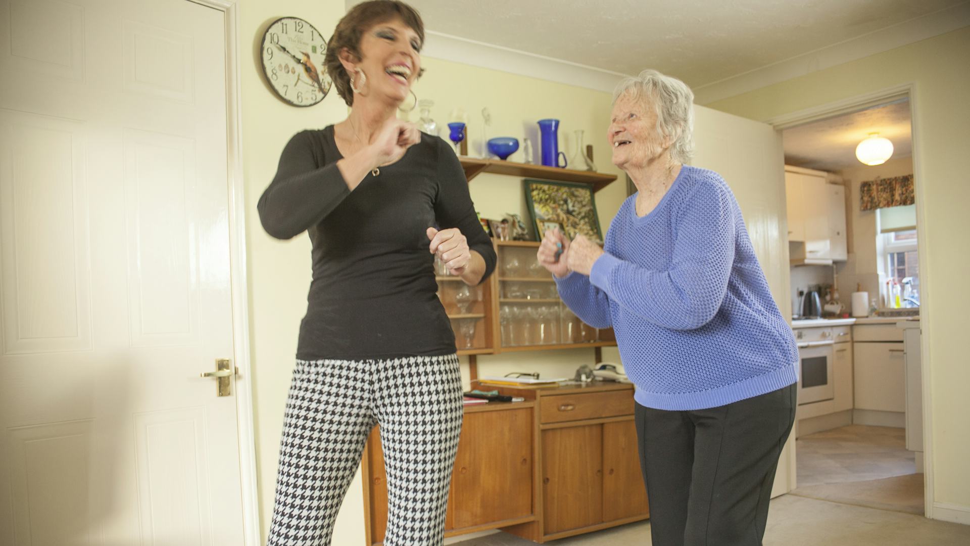 Carer and Elderly lady dancing