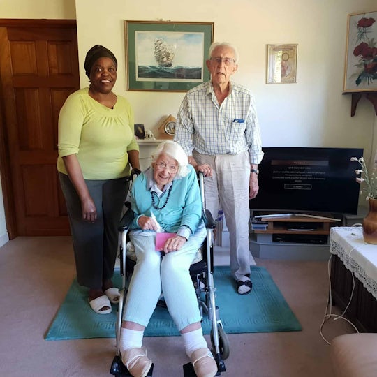 Pictured: TrinityCarer, Joana, with Pat and Dennis